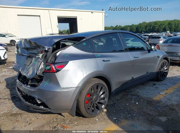 7SAYGDEF9SA338715 2025 TESLA MODEL Y Gray Vista frontal