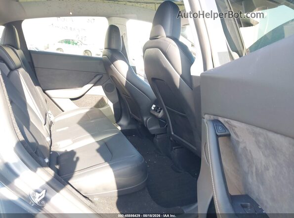 7SAYGDEF9SA338715 2025 TESLA MODEL Y Gray Vista de la etiqueta del VIN