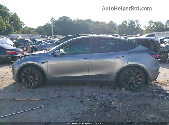7SAYGDEF9SA338715 2025 TESLA MODEL Y Gray Vista interior trasera