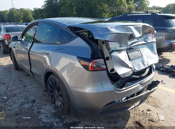7SAYGDEF9SA338715 2025 TESLA MODEL Y Gray 