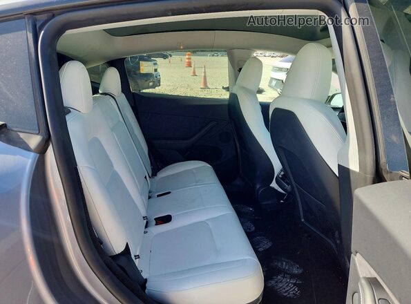 7SAYGDEF9SA351948 2025 TESLA MODEL Gray Rear seats view