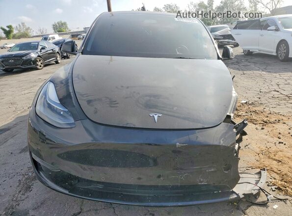 7SAYGDEFXNF573065 2022 TESLA MODEL Black Front view