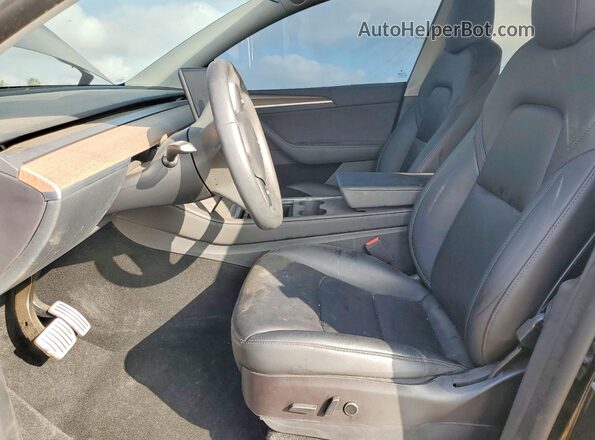7SAYGDEFXNF573065 2022 TESLA MODEL Black Front interior view