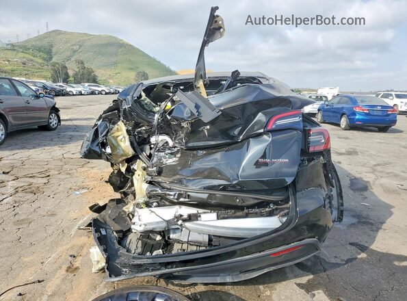 7SAYGDEFXNF573065 2022 TESLA MODEL Black Rear view