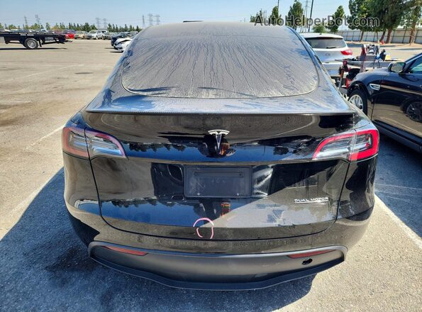 7SAYGDEFXPF839848 2023 TESLA MODEL Black Вид ззаду