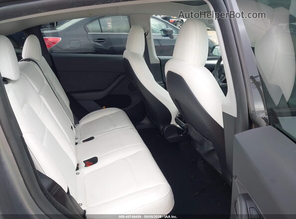 7SAYGDEFXRA303594 2024 TESLA MODEL Y Gray VIN კოდის სტიკერის ხედი
