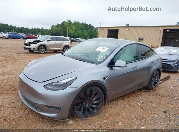 7SAYGDEFXRA303594 2024 TESLA MODEL Y Gray წინა მარცხენა ხედი სამი მეოთხედიდან