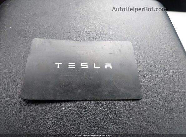 7SAYGDEFXRA303594 2024 TESLA MODEL Y Gray უკანა ხედი