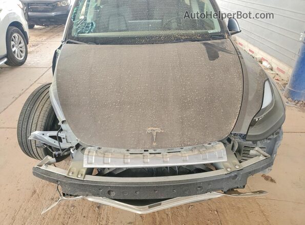 7SAYGDEFXRF170046 2024 TESLA MODEL Gray Rear interior view