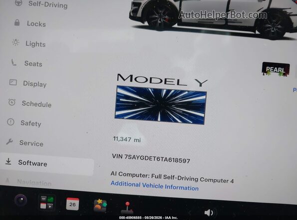 7SAYGDET6TA618597 2026 TESLA MODEL Y White Vista de los asientos traseros