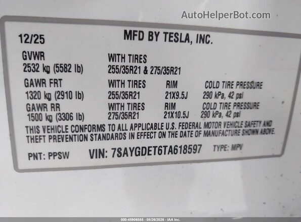 7SAYGDET6TA618597 2026 TESLA MODEL Y White Vista del compartimento del motor