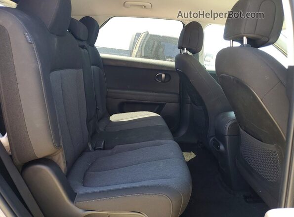 7YAKM4DA2SY011604 2025 HYUNDAI IONIQ Gray Вид задньої частини салону