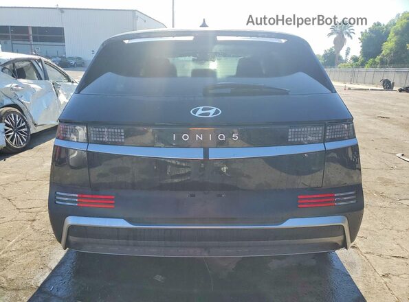 7YAKM4DA3SY026600 2025 HYUNDAI IONIQ Gray Vista trasera