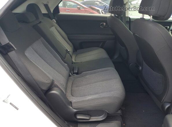 7YAKM4DA9SY017609 2025 HYUNDAI IONIQ White Vista interior trasera
