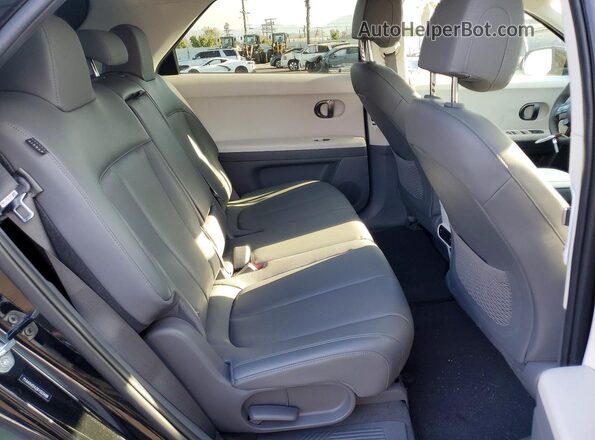 7YAKN4DA2SY023488 2025 HYUNDAI IONIQ Black Rear interior view