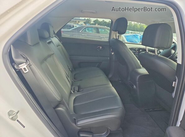 7YAKN4DA6SY008296 2025 HYUNDAI IONIQ White Rear seats view
