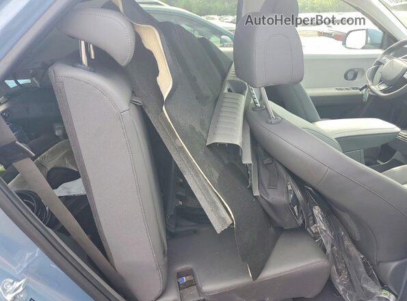 7YAKNDDC8SY018958 2025 HYUNDAI IONIQ Синий Вид задней части салона