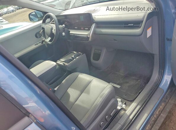 7YAKNDDC8SY018958 2025 HYUNDAI IONIQ Синий Вид панели приборов