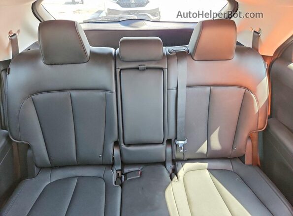 7YAKNDDC8SY033458 2025 HYUNDAI IONIQ White Rear seats view