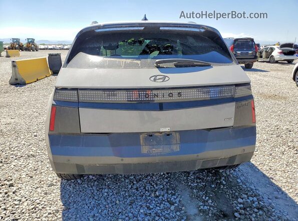 7YAKPDDC3SY033572 2025 HYUNDAI IONIQ Gray Widok z tyłu