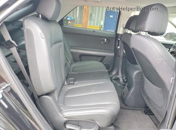 7YAKR4DA0SY015345 2025 HYUNDAI IONIQ Черный Вид задней части салона