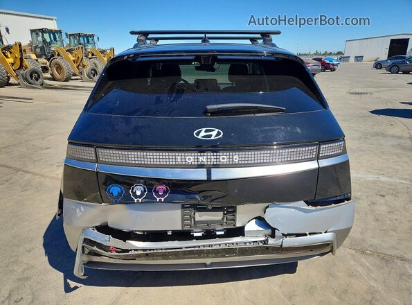 7YAKR4DA1SY024992 2025 HYUNDAI IONIQ Black Vista trasera