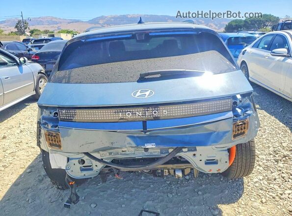 7YAKR4DA3TY055131 2026 HYUNDAI IONIQ Синий Вид сзади
