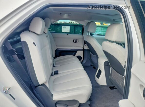 7YAKR4DA5TY046303 2026 HYUNDAI IONIQ White უკანა სავარძლების ხედი