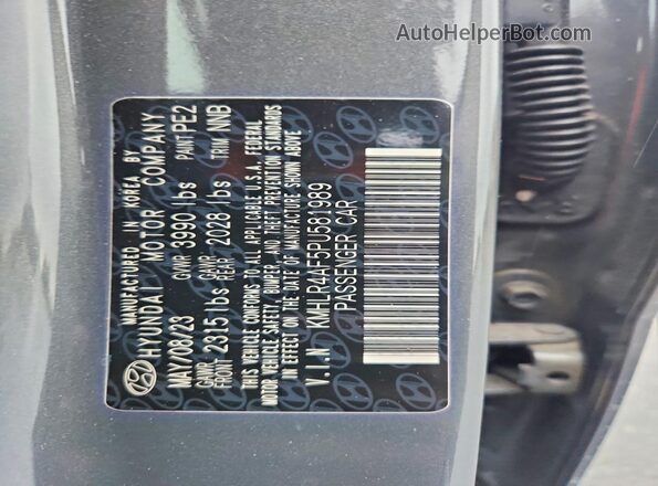 KMHLR4AF5PU581989 2023 HYUNDAI ELANTRA Charcoal VIN კოდის სტიკერის ხედი