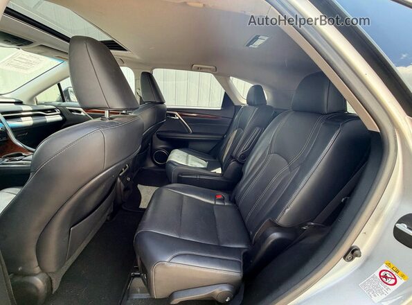 JTJGZKCA7J2008328 2018 LEXUS RX Серебряный Вид салона спереди