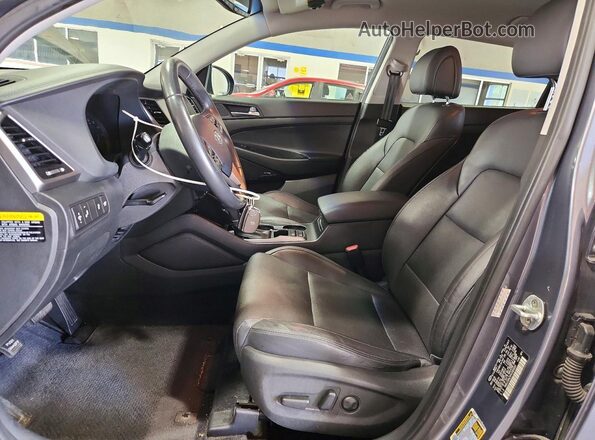 KM8J33A2XHU389033 2017 HYUNDAI TUCSON Gray Вид панелі приладів