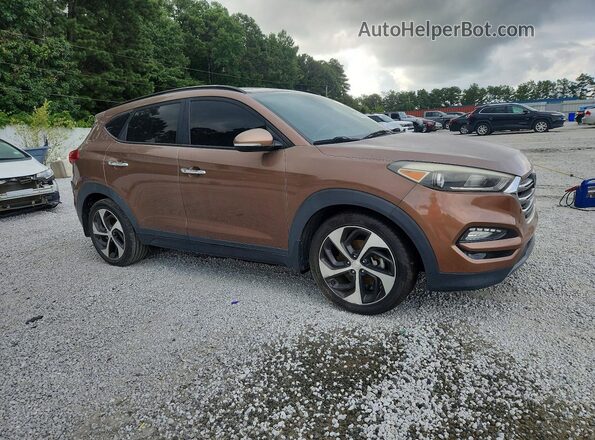 KM8J33A20GU076961 2016 HYUNDAI TUCSON Brown Vista frontal