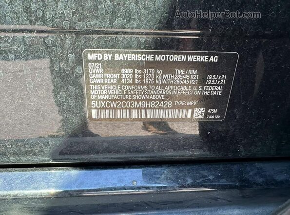 5UXCW2C03M9H82428 2021 BMW X7 Black Սալոնի հետևի տեսք