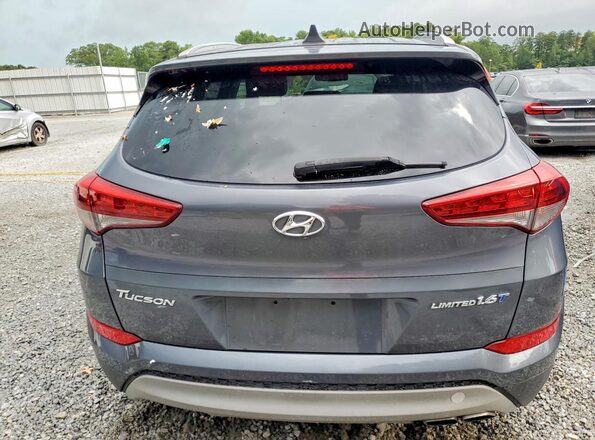 KM8J33A23HU352289 2017 HYUNDAI TUCSON Gray Front interior view