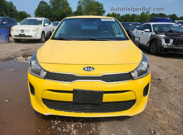 3KPA25AB8JE119984 2018 KIA RIO Yellow Vista trasera