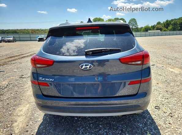 KM8J33AL8KU915255 2019 HYUNDAI TUCSON Blue Vista interior delantera