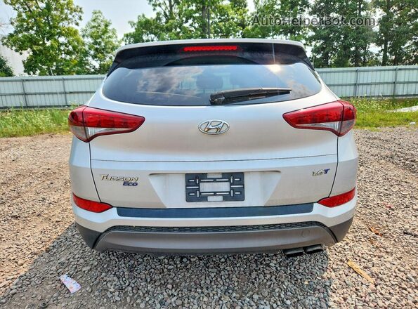 KM8J33A22GU164927 2016 HYUNDAI TUCSON Silver Widok wnętrza z przodu
