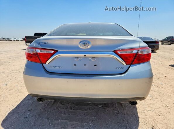 4T1BK1FK2GU571098 2016 TOYOTA CAMRY Silver Vista interior delantera