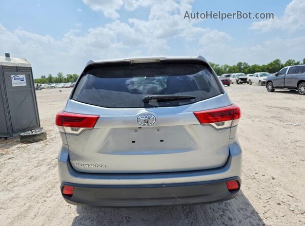 5TDZARFH7KS054577 2019 TOYOTA HIGHLANDER Silver Front interior view