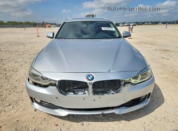 WBA8A9C5XJAH14547 2018 BMW 3 SERIES Silver Rear view