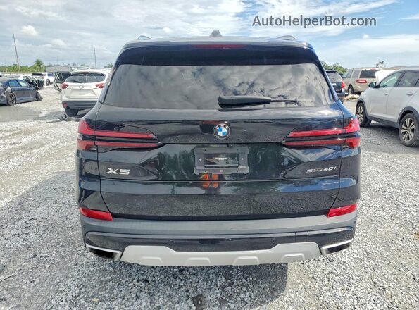 5UX13EU04R9S58824 2024 BMW X5 Black Front interior view
