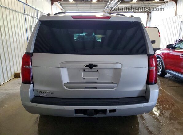 1GNSKBKC1KR159380 2019 CHEVROLET TAHOE Silver Front interior view