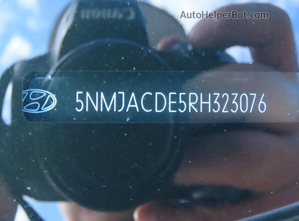 5NMJACDE5RH323076 2024 HYUNDAI TUCSON Белый Вид задней части салона