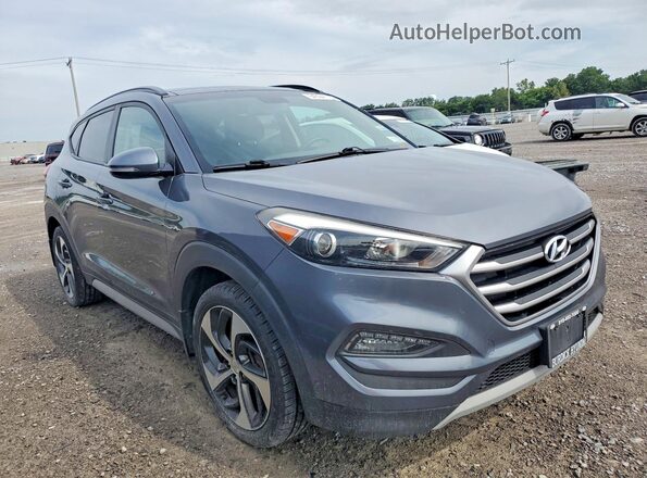 KM8J3CA2XJU757863 2018 HYUNDAI TUCSON Gray Widok z przodu