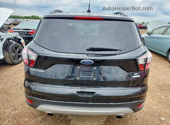 1FMCU0GD4JUD02679 2018 FORD ESCAPE Black Vista interior delantera