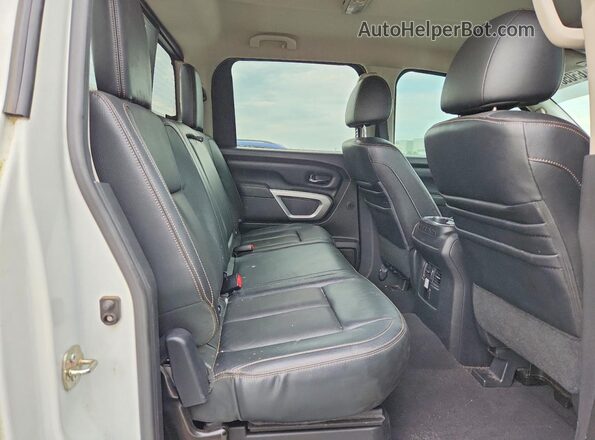 1N6AA1E6XHN502255 2017 NISSAN TITAN White Rear interior view