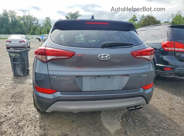 KM8J3CA2XJU757863 2018 HYUNDAI TUCSON Gray Widok wnętrza z przodu