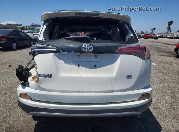 JTMNFREV7JJ725510 2018 TOYOTA RAV4 White Вид салону спереду