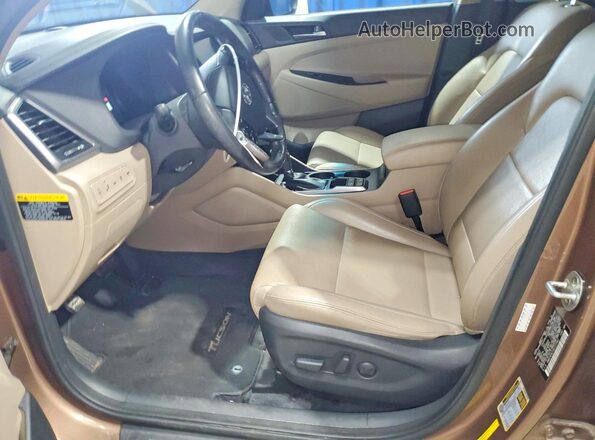 KM8J3CA21GU137542 2016 HYUNDAI TUCSON Коричневый Вид панели приборов
