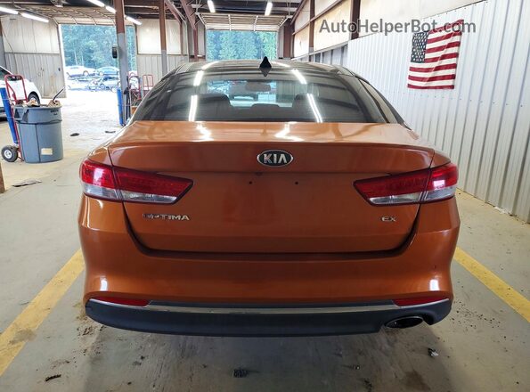 5XXGU4L39GG040280 2016 KIA OPTIMA Оранжевый Вид салона спереди